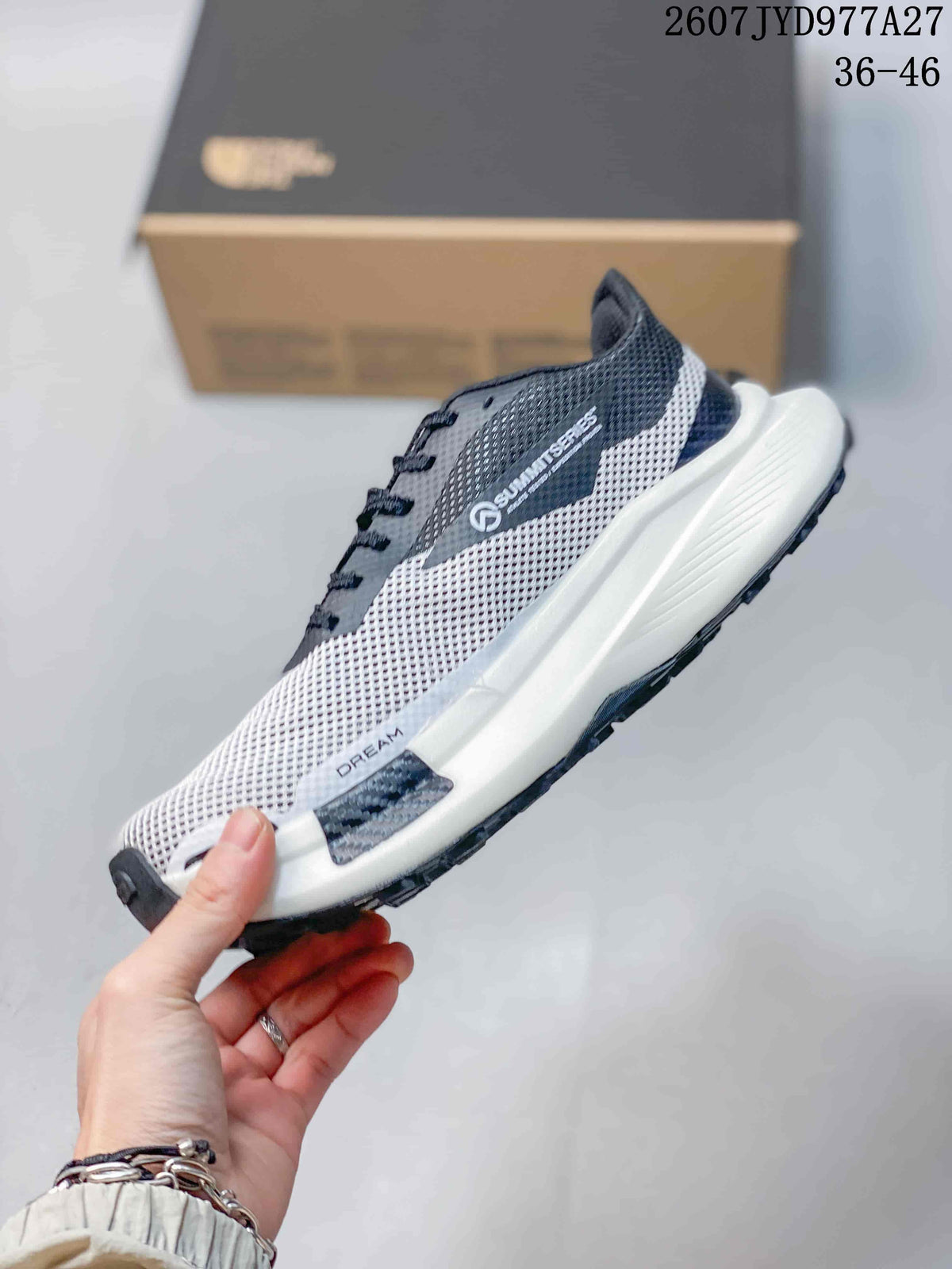 Side profile showing the mesh upper, Summit Vectiv Pro branding, white midsole, and dark outsole.