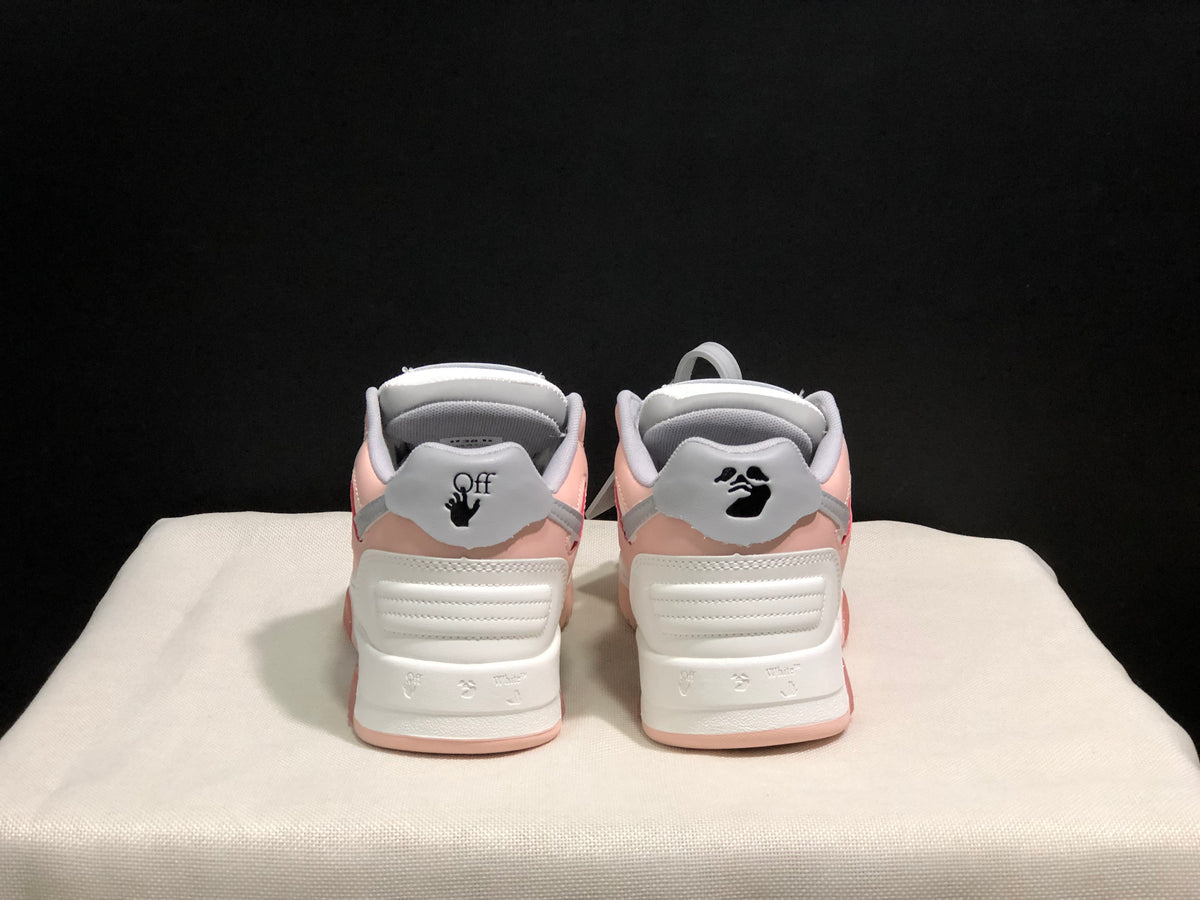 Rear view of the sneaker pair showing padded heel areas and printed heel details.