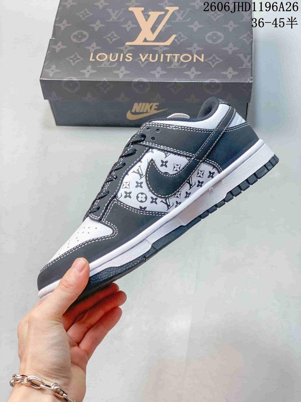 Side view of a grey and white patterned low-top sneaker