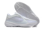All-white low-top basketball shoes with a pale patterned outsole.