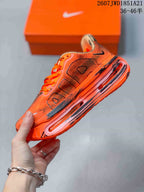 Side profile showing the black Swoosh, perforated upper panels and visible midsole window.