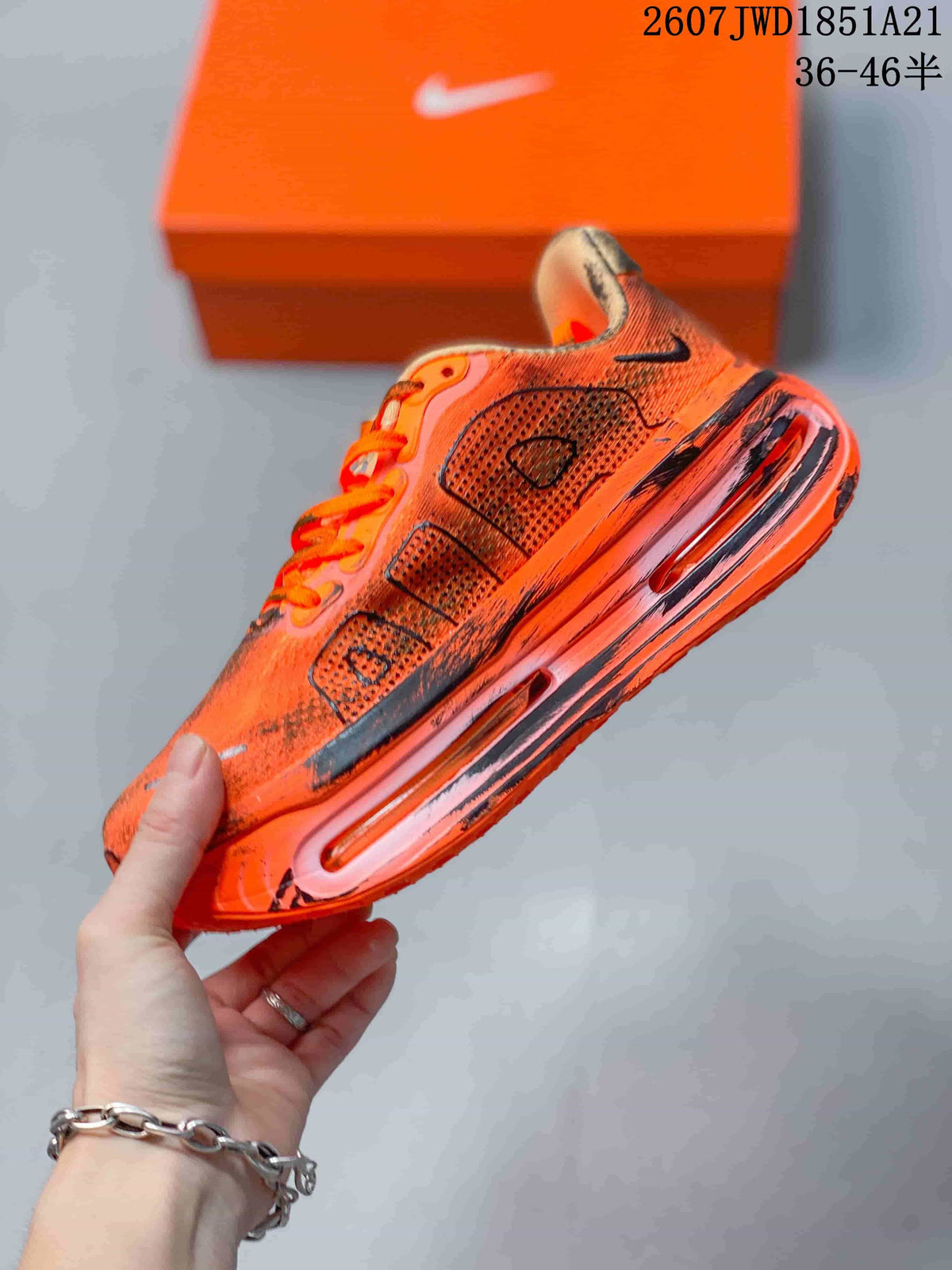 Side profile showing the black Swoosh, perforated upper panels and visible midsole window.