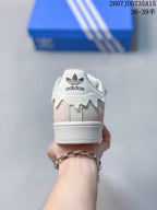 Rear view showing the adidas trefoil branding, layered heel detail, and white midsole.
