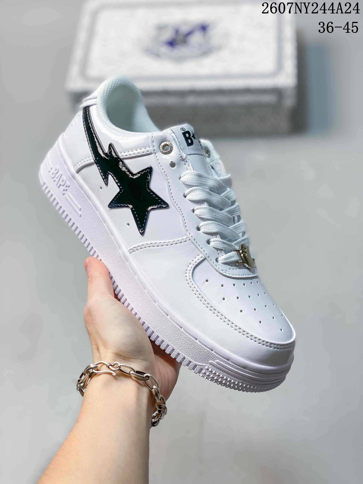 All-white low-top sneaker with black star side graphic, white laces and white sole; source overlay shows style code 2607NY244A24 and size range 36–45.