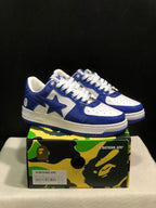 Blue and white Bape Sta sneakers displayed on a camouflage Bape-branded shoe box; the box label shows US 8, UK 7, EU 41, and CM 26.