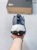Rear view of the sneaker showing The North Face branding, padded heel collar, white midsole, and black outsole.