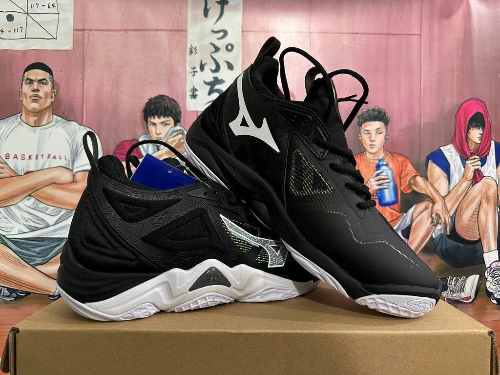 Side view of black Mizuno Wave Momentum 3 shoes with white side logos and outsoles.