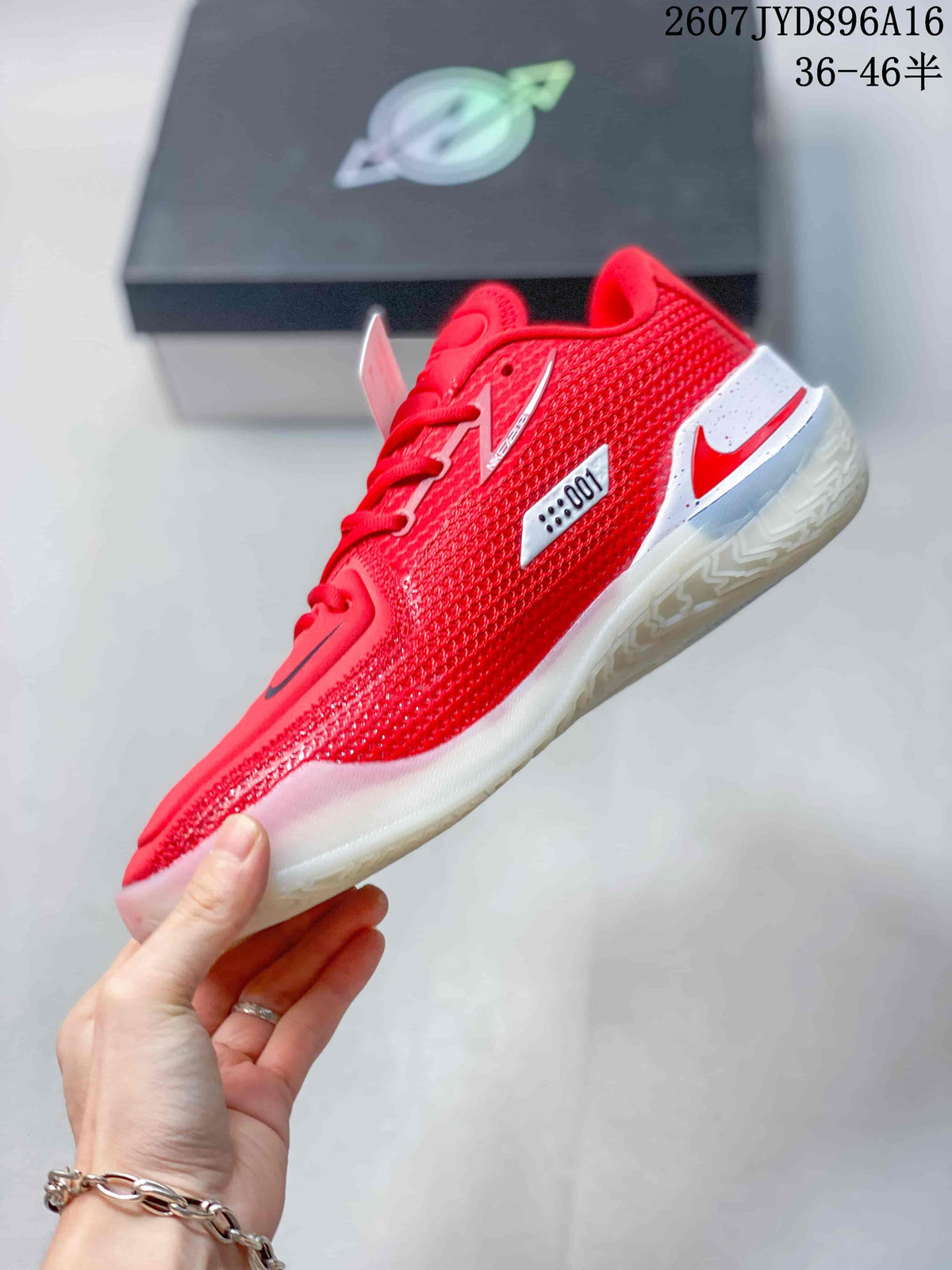 Side view of the red basketball shoe showing the textured upper, contrasting branding and layered white and blue midsole details.