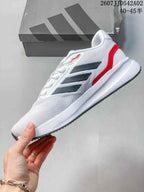 Side profile of the white Adidas Runfalcon 5 with black stripes and red heel accent.