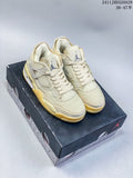 Pair of cream Jordan Air Jordan 4 Retro OG sneakers displayed on a branded shoe box