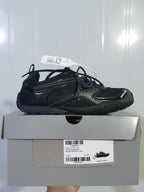 Side profile of a black Balenciaga Radar sneaker resting on its box; the box label shows Radar Sneaker/W, color Black, and size E 40.