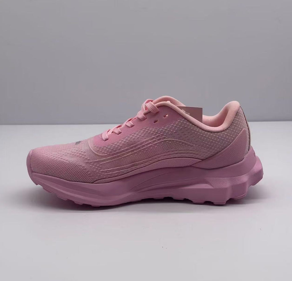 Opposite side profile of the pink Alo sneaker showing the layered upper and raised sole design.