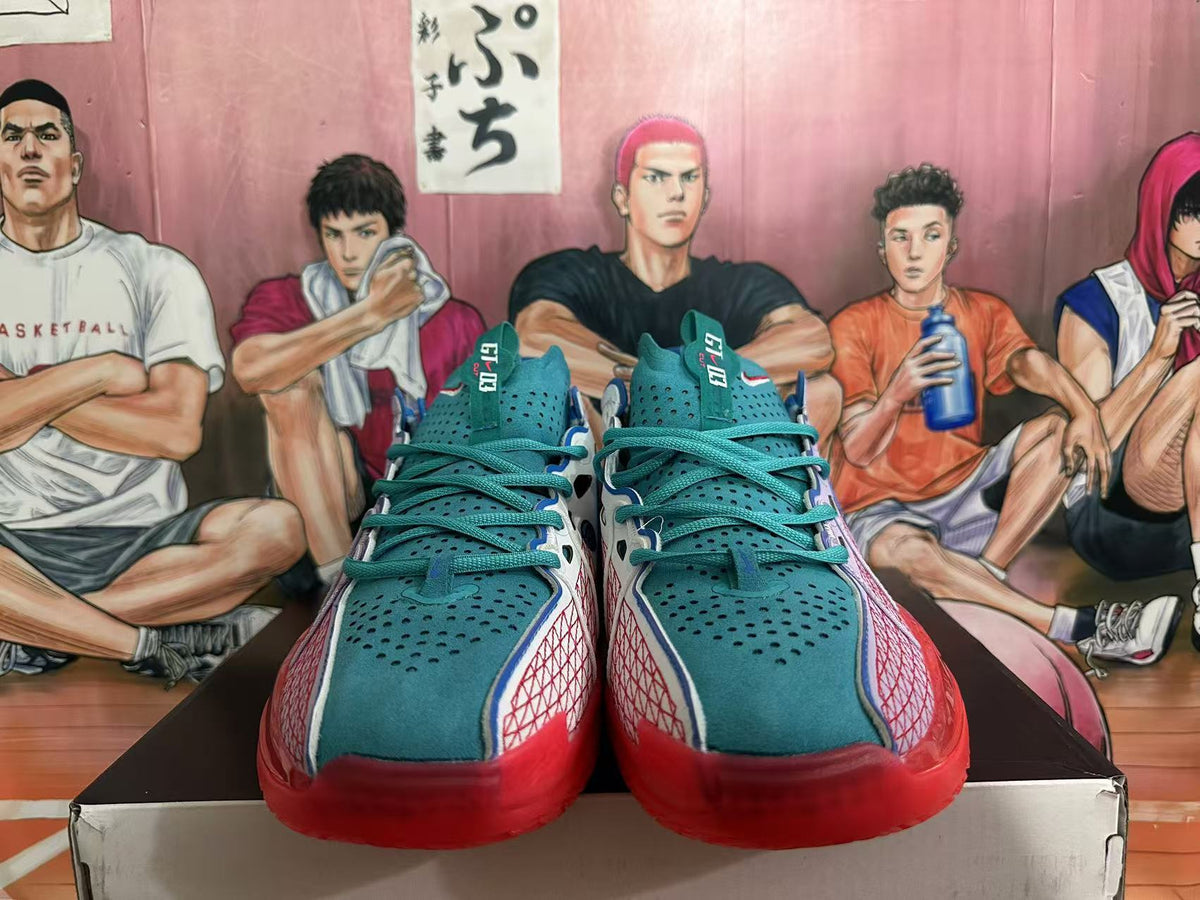 Front view of purple, teal, white, and red Nike basketball sneakers with perforated toe boxes and teal laces.