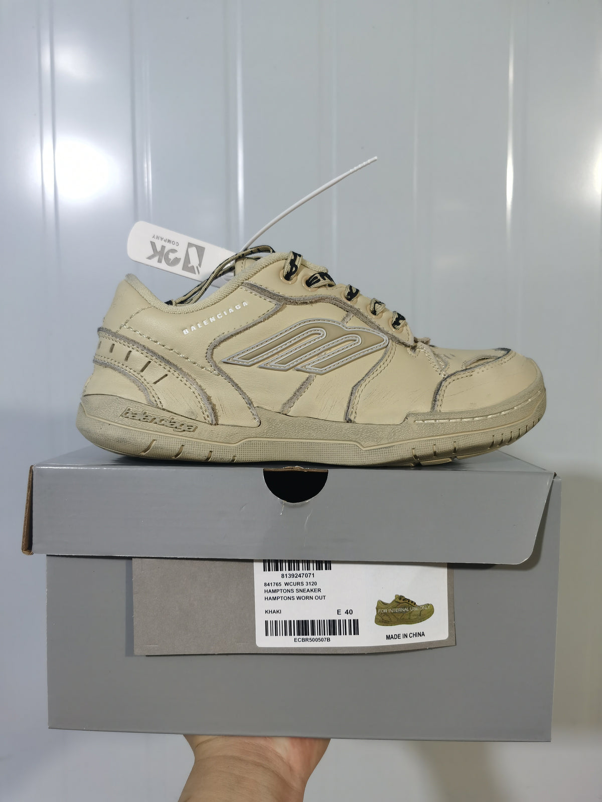 Khaki Balenciaga 3120 Hamptons sneaker displayed on its box, with the box label visible.