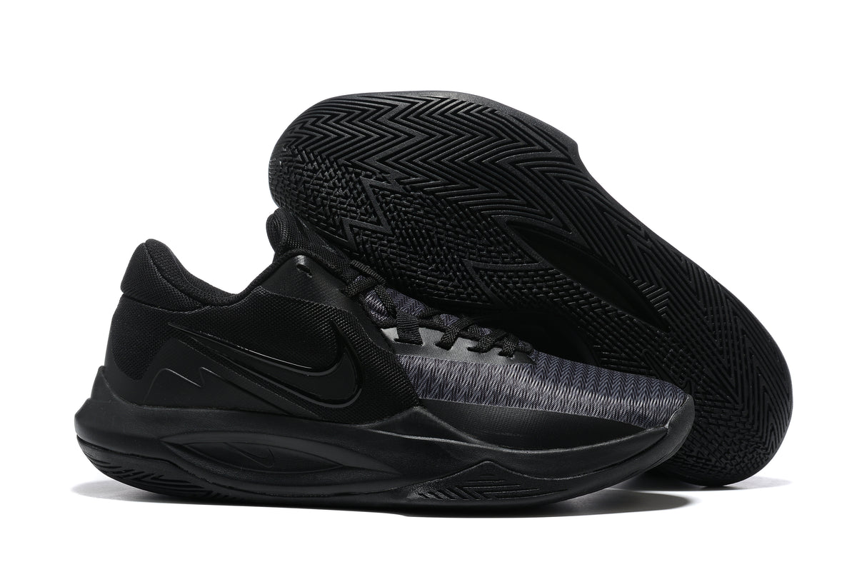 All-black basketball shoe with a dark patterned outsole.