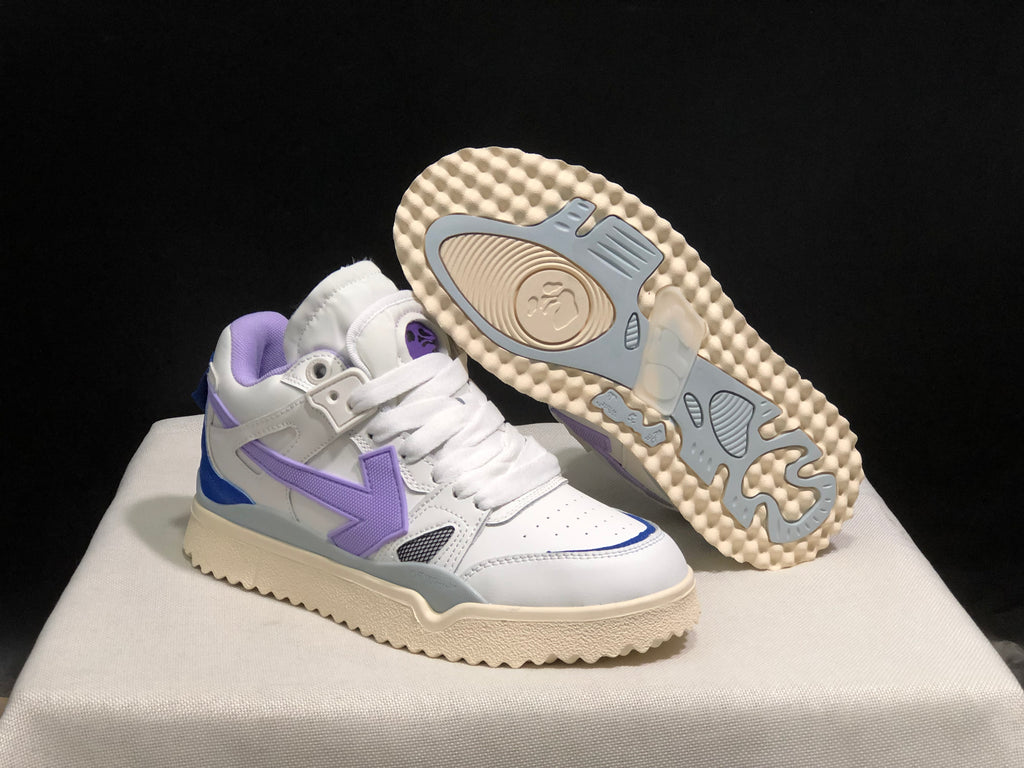 Angled product view with one sneaker lifted to reveal the cream-colored outsole and gray tread inserts.