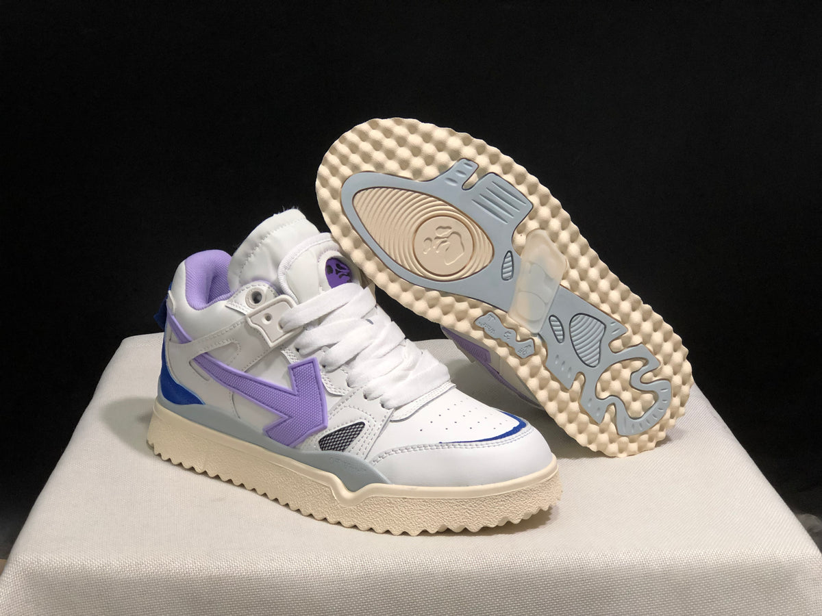 Angled product view with one sneaker lifted to reveal the cream-colored outsole and gray tread inserts.