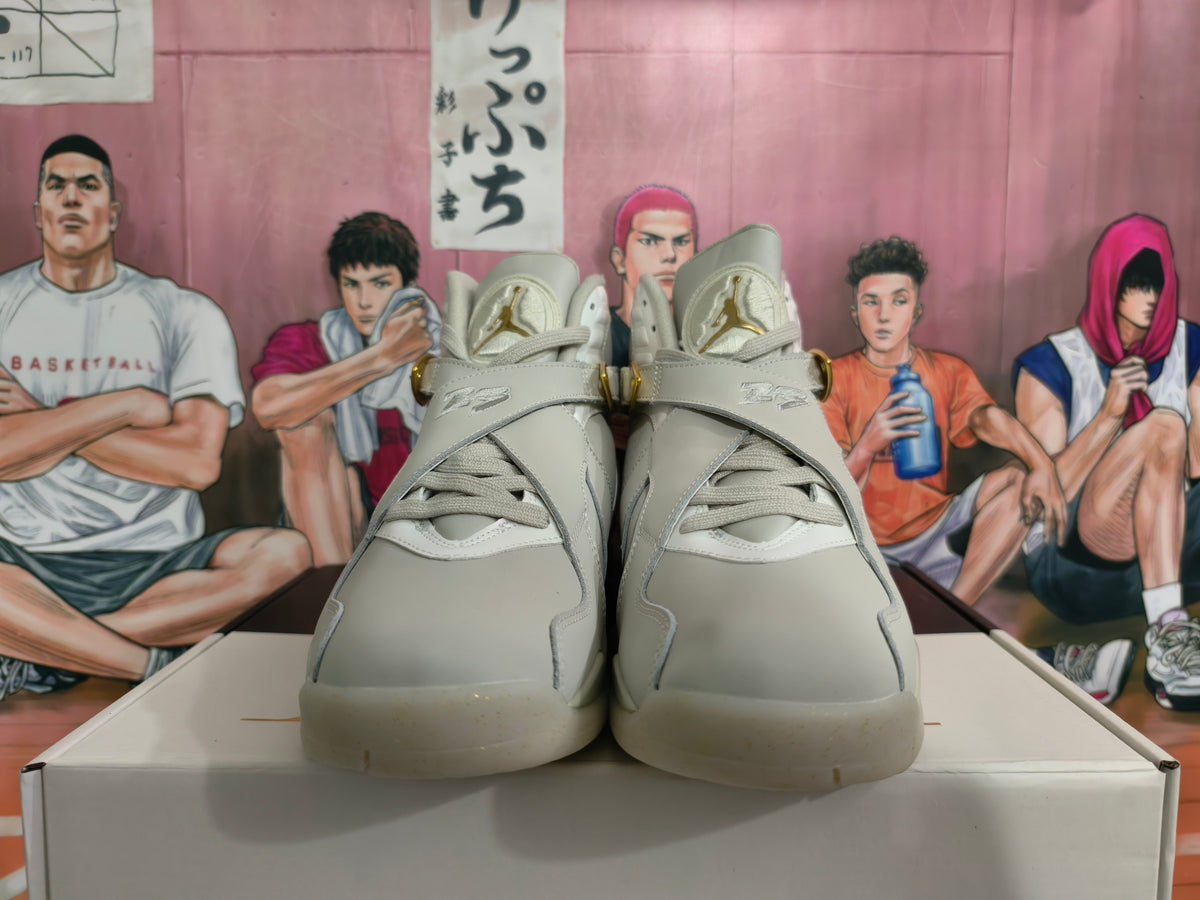 Front view showing the tongue branding and cross-strap details on the sneakers