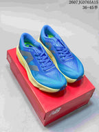 Pair of blue and pale yellow New Balance running shoes displayed on a red shoe box; overlay text shows style code 2607TGD765A15 and size range 36–45.