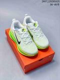 Pair of Nike Vomero 18 sneakers in white and neon green displayed on an orange shoe box; JD295A25 and size range 36–46.5 are overlaid.