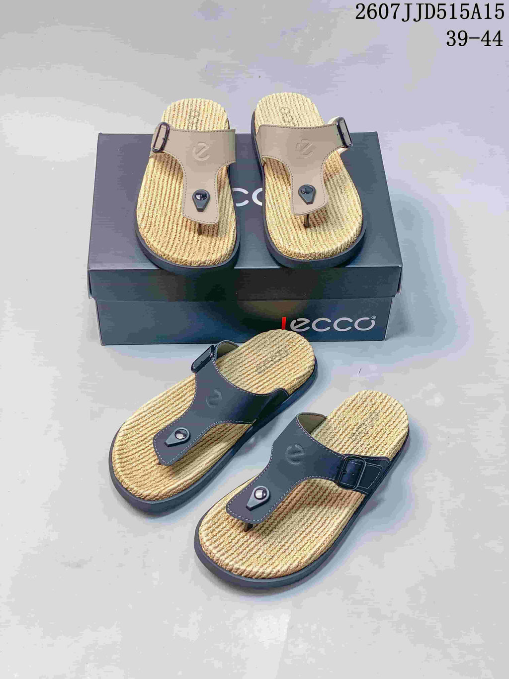 Beige and black sandal color options arranged around a shoebox, showing the toe-post construction and textured footbeds.