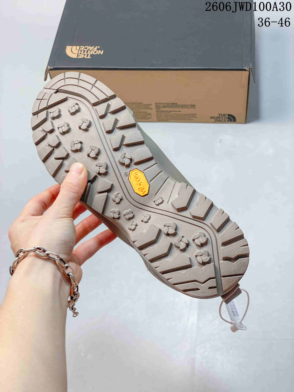 Lugged outsole with a visible Vibram logo