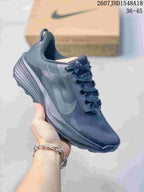 Dark gray Nike ReactX Pegasus ACG Trail 6 sneaker with tonal branding and a textured sole.