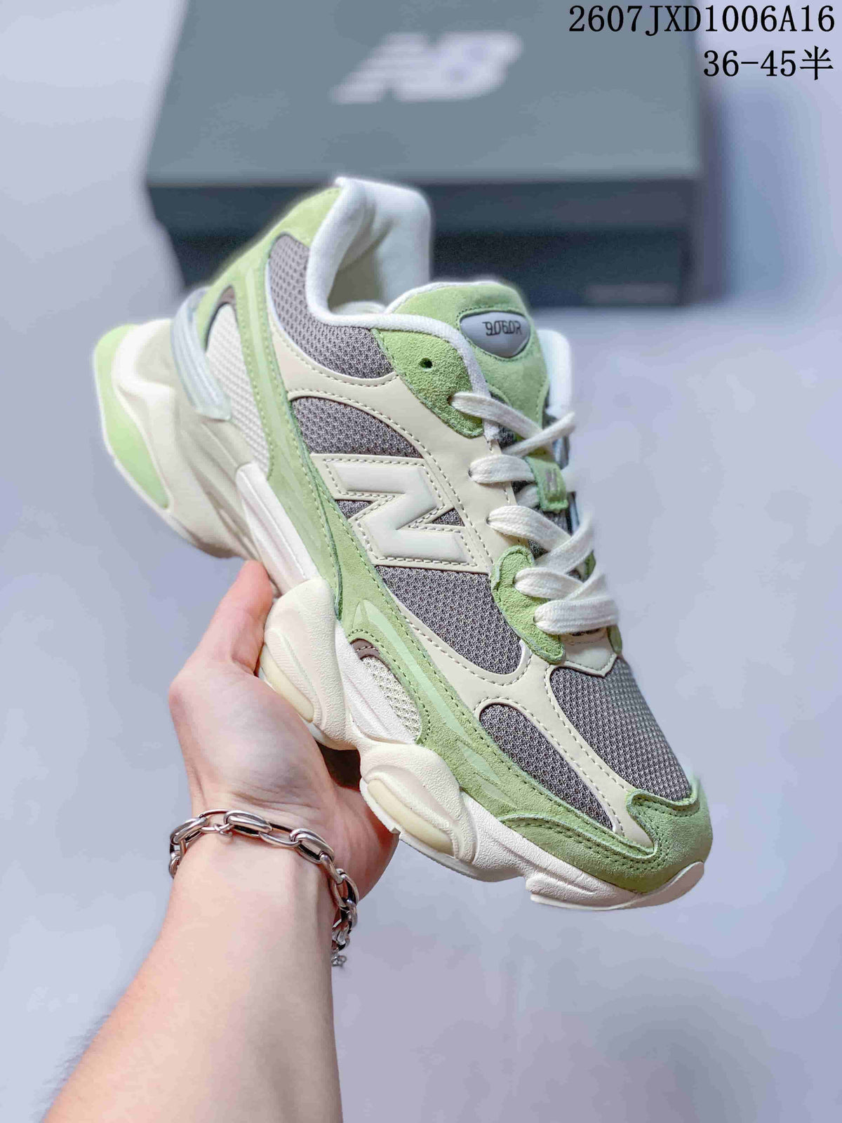 Angled side view of the green, cream, and gray sneaker showing layered panels, gray mesh, white laces, and the sculpted outsole.