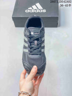 Front view of the charcoal gray lace-up sneaker