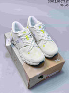 Pair of white and lime On Running low-top sneakers displayed on a shoebox, with the style code and EU size range visible above.