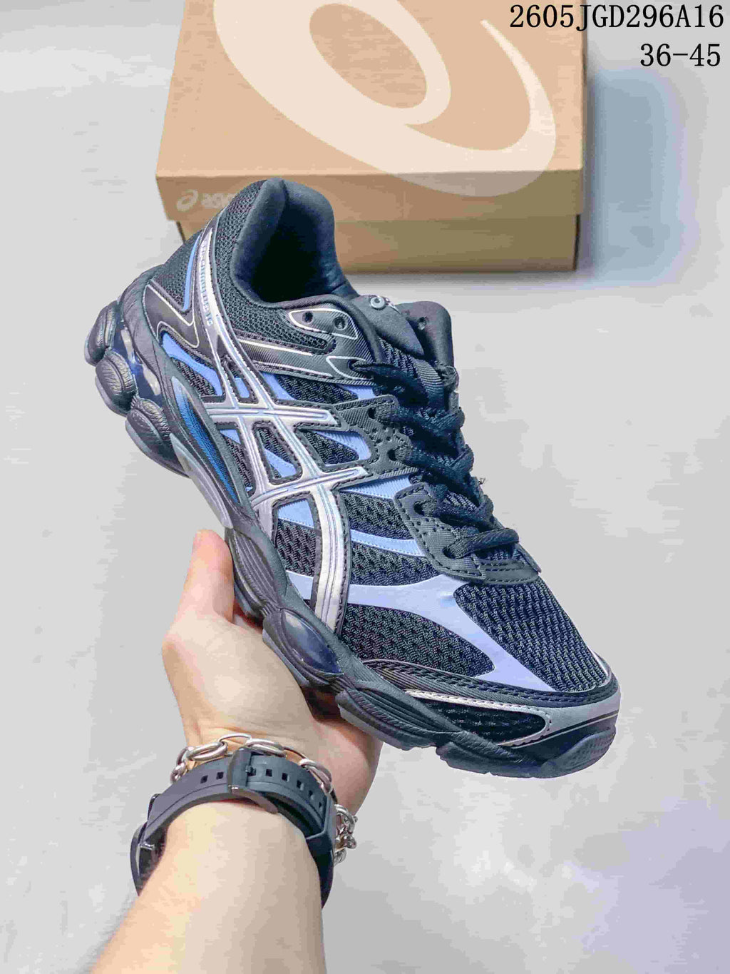 Black ASICS GEL-Cumulus 16 sneaker with light-colored overlays