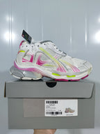 Balenciaga Runner sneaker displayed on its box, with the box label and photographed shoe visible.