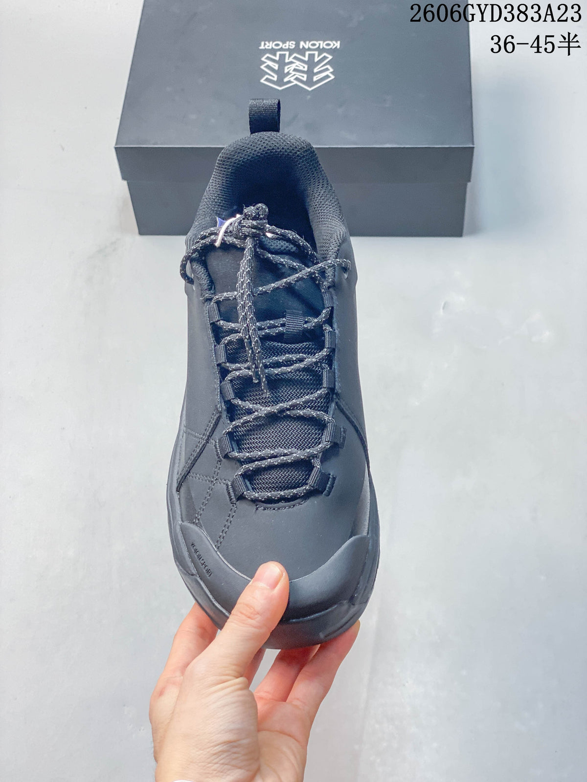 Top view showing the shoe's laces, webbing loops, and toe area