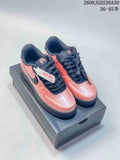 Pair of coral-pink and black Nike Air Force 1 ’07 low-top sneakers on a box; image overlay states EU sizes 36–45.5.