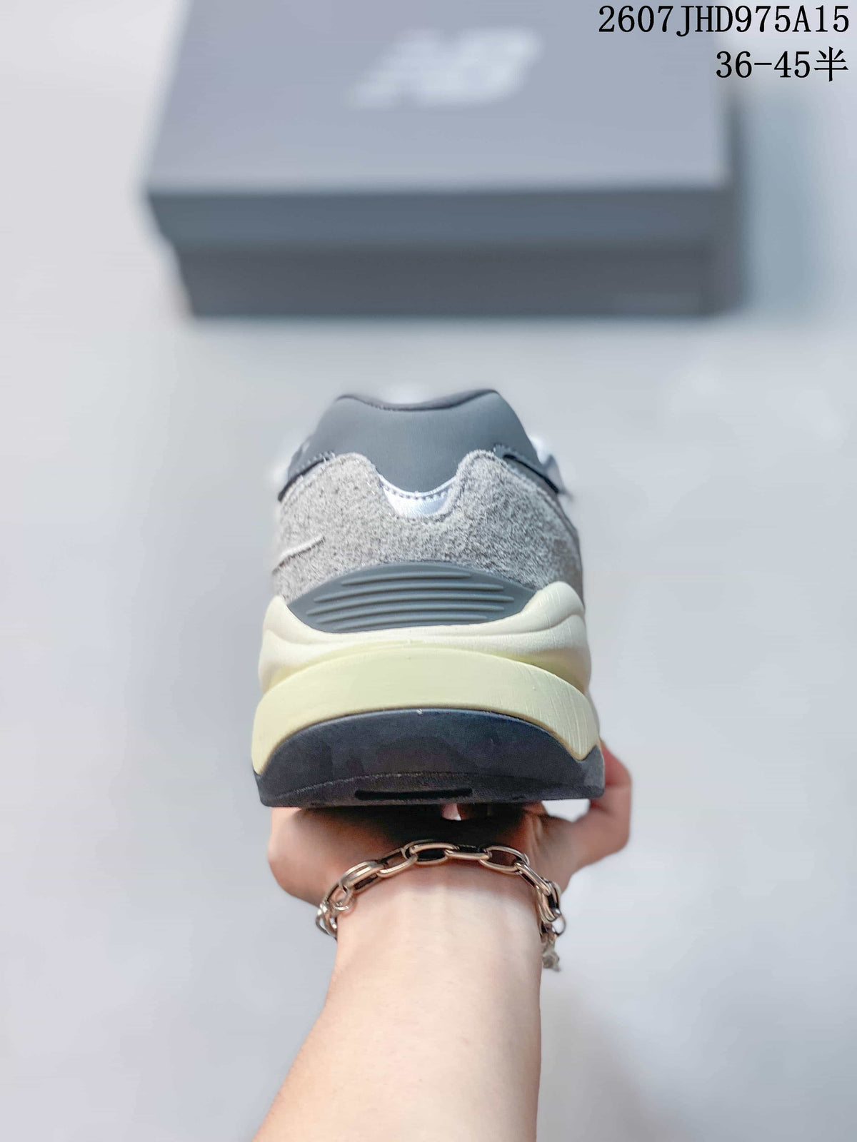 Rear view showing the padded heel, layered panels and contrasting outsole.