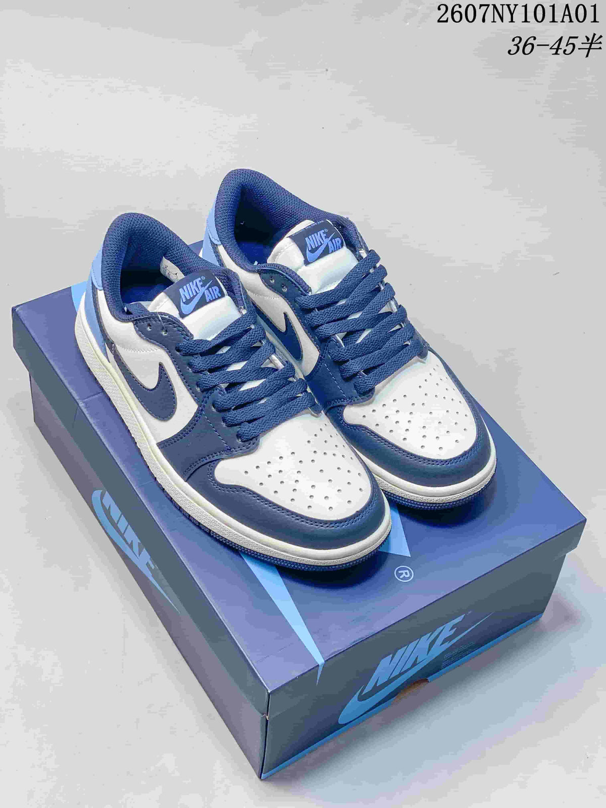 Pair of white and blue Air Jordan 1 Low sneakers on a blue shoebox