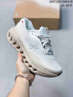 All-white On Cloudsurfer 3 sneaker with a tonal sculpted outsole and side logo.