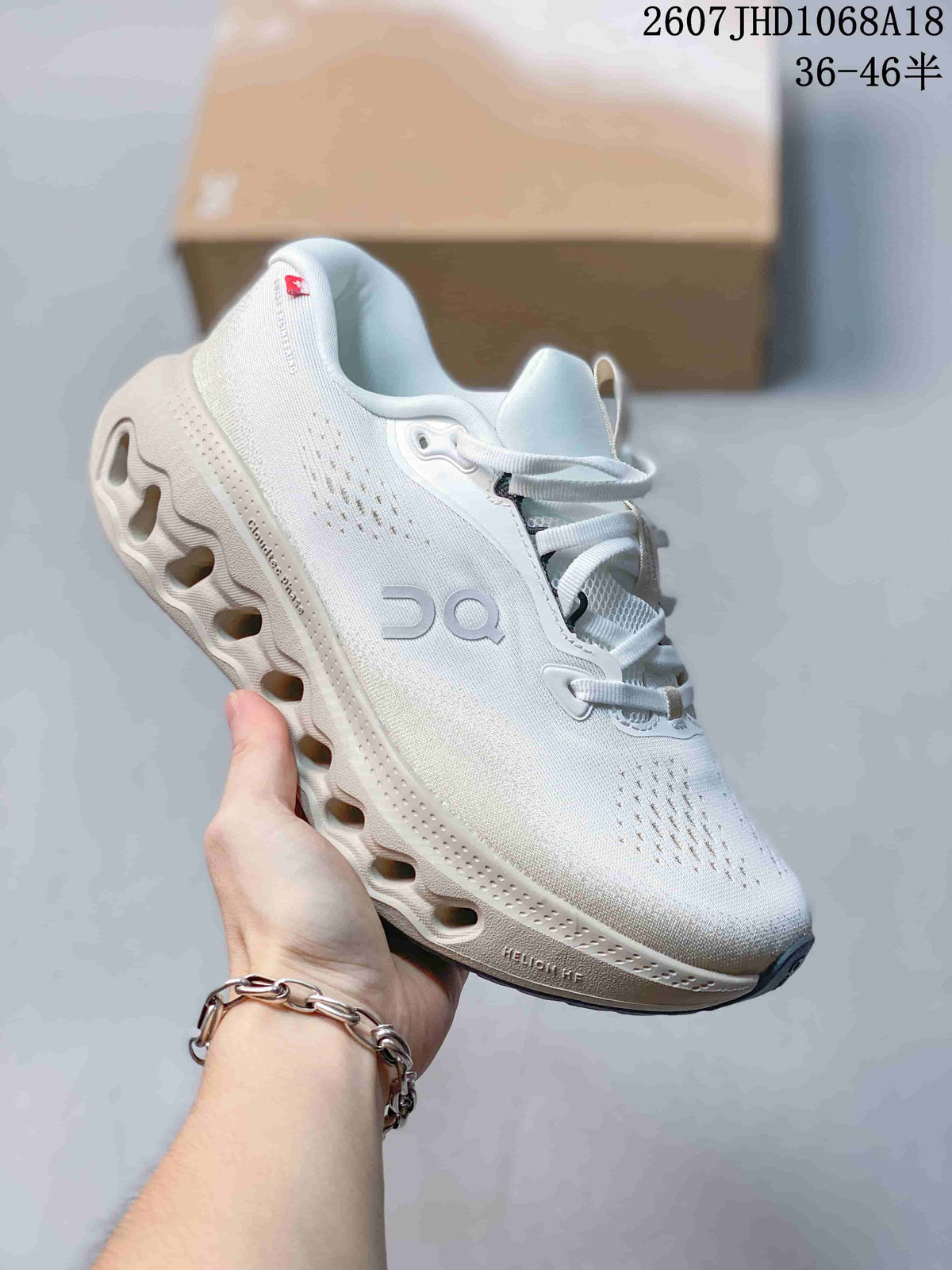 All-white On Cloudsurfer 3 sneaker with a tonal sculpted outsole and side logo.