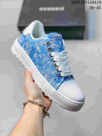 Angled view of the blue and white NUMERIS low-top sneaker with lace-up closure and raised white sole; image text shows style code 2607JDY558A18 and size range 36–45.