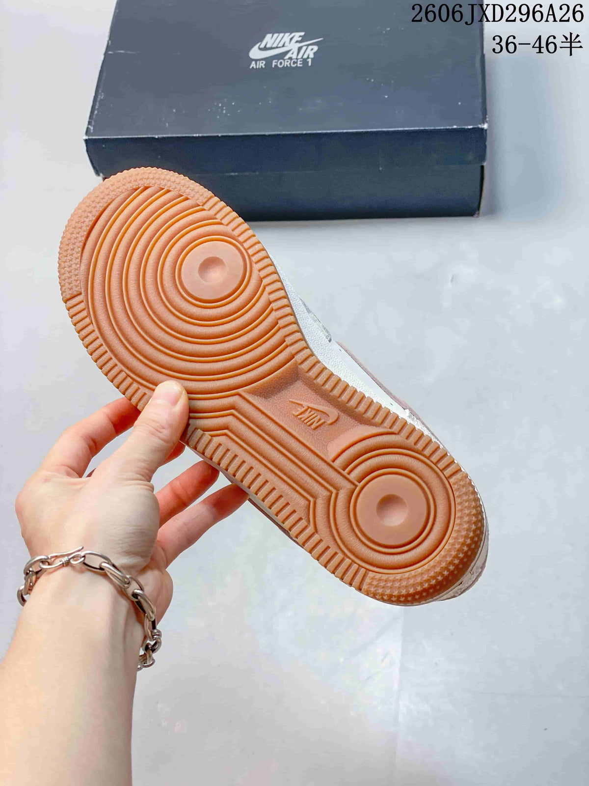 Underside view showing the gum-colored outsole of the Nike Air Force 1 '07 sneaker