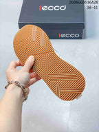 Close-up of the sneaker’s gum-colored outsole with patterned tread