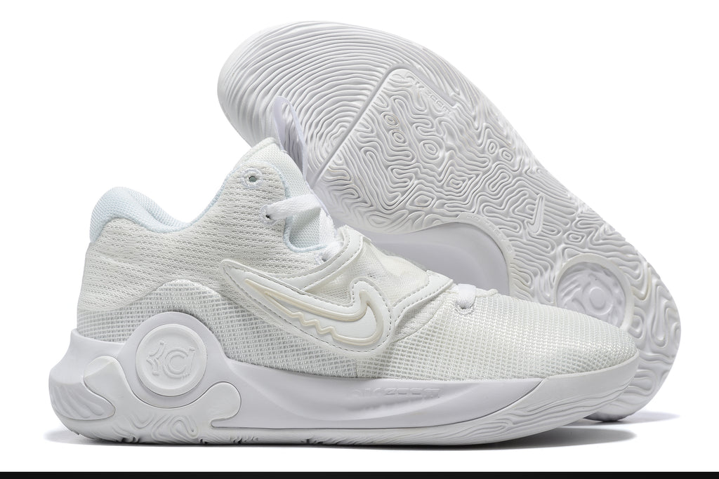 All-white Nike KD basketball shoes with a matching textured outsole.