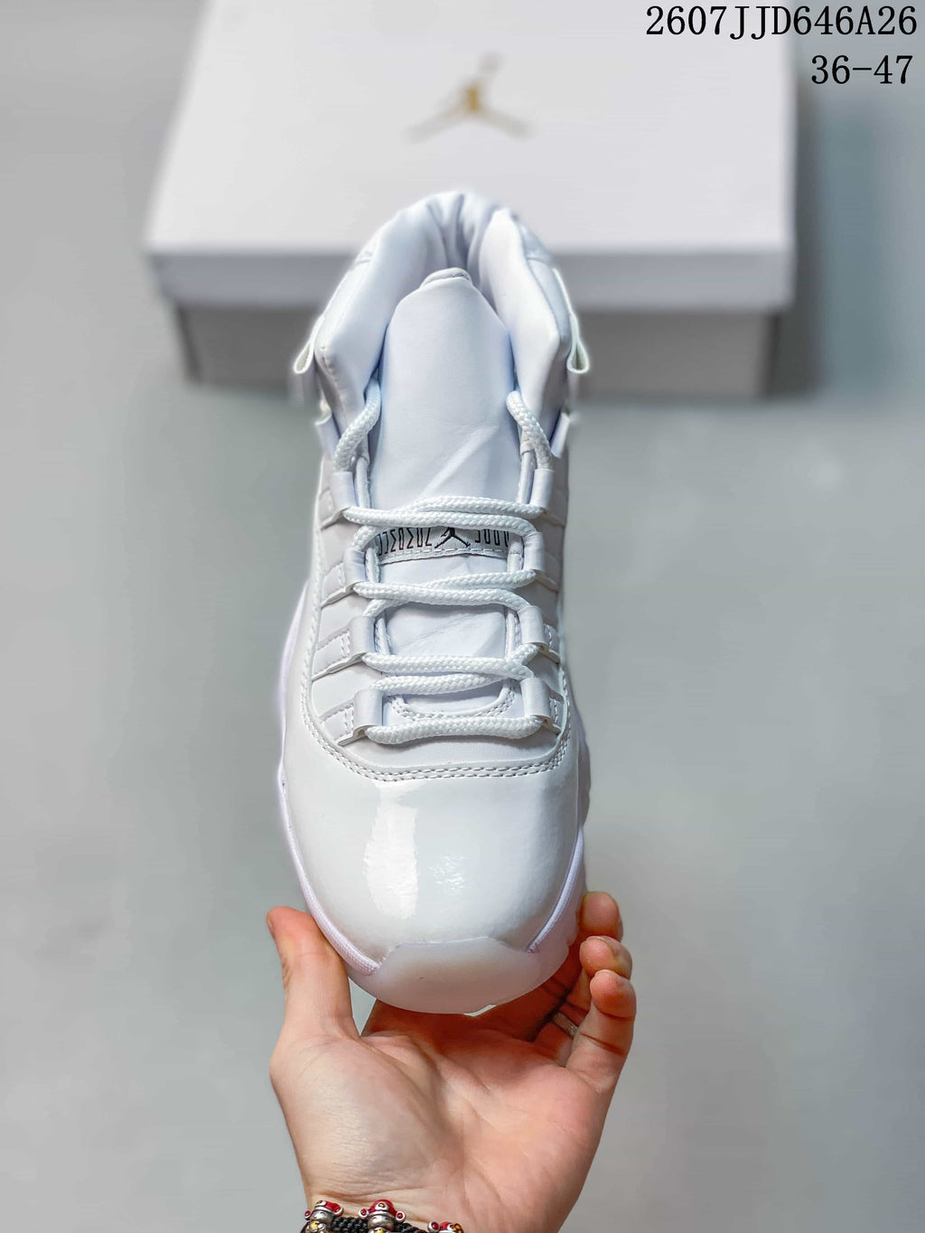 Top view showing the padded tongue, rope-style laces, structured lace loops and glossy toe area.