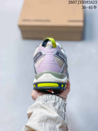 Rear view of the sneaker showing layered heel panels, padded collar, and lime accent details.