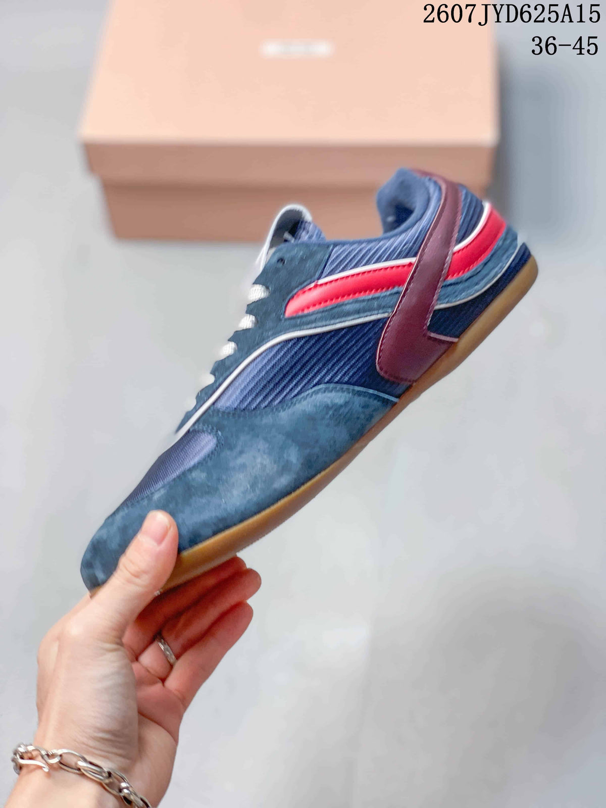 Side view of a navy low-top sneaker showing layered red and burgundy accents, contrast piping, and the gum-colored sole; image text lists sizes 36–45.