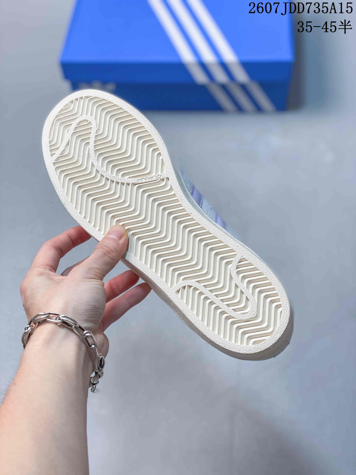 Close-up of the sneaker outsole showing a white herringbone tread pattern.