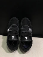 Top view showing the black laces, Jumpman tongue logos and adjustable forefoot straps.