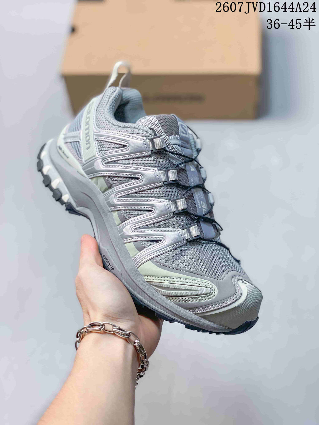 Angled side view highlighting the layered upper, padded collar and low-top silhouette.