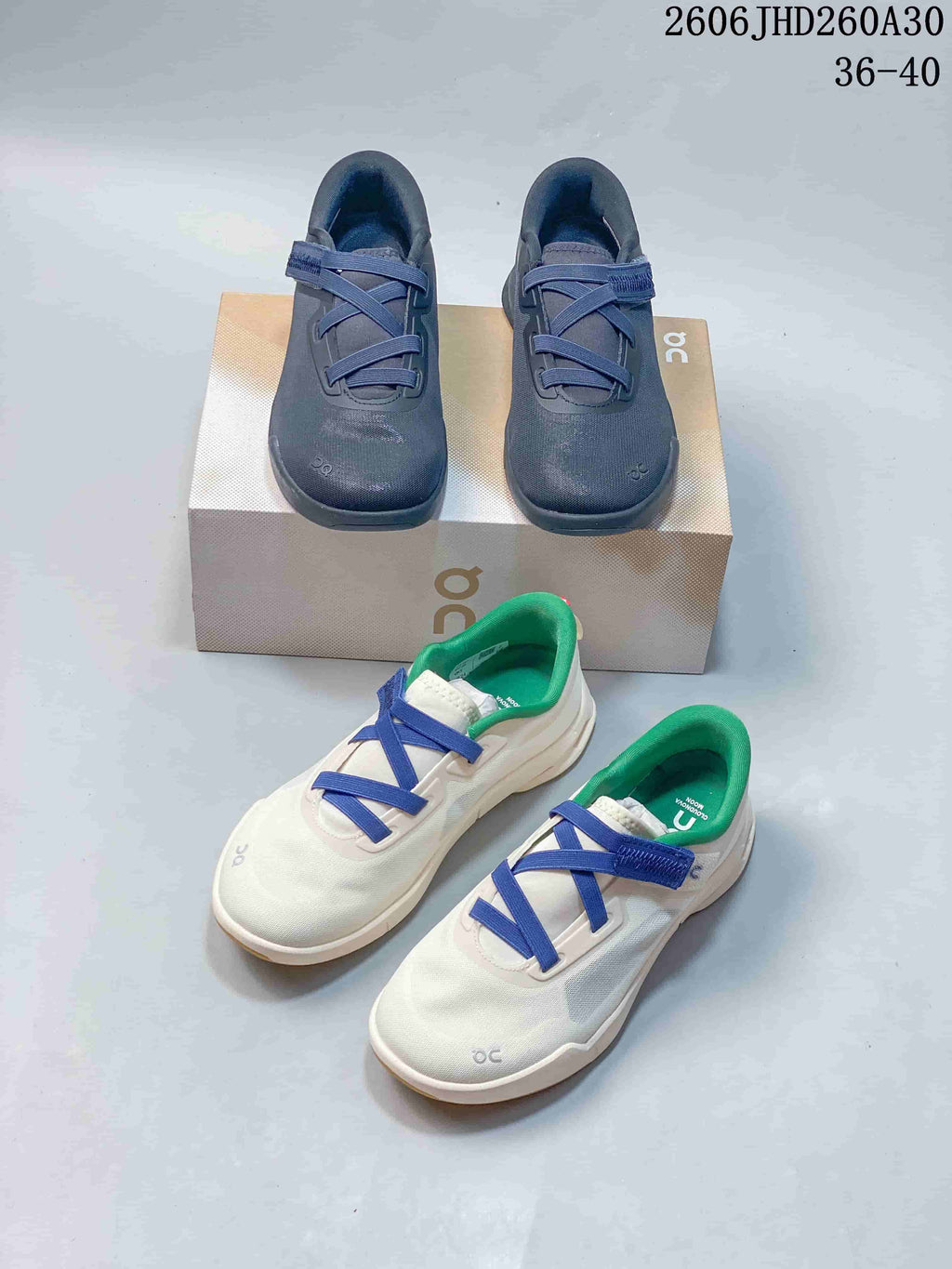Dark blue and off-white On Cloudnova Moon sneakers shown together.