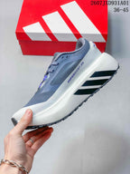 Side view of a gray adidas Hyperboost ATR sneaker with three stripes and a white midsole